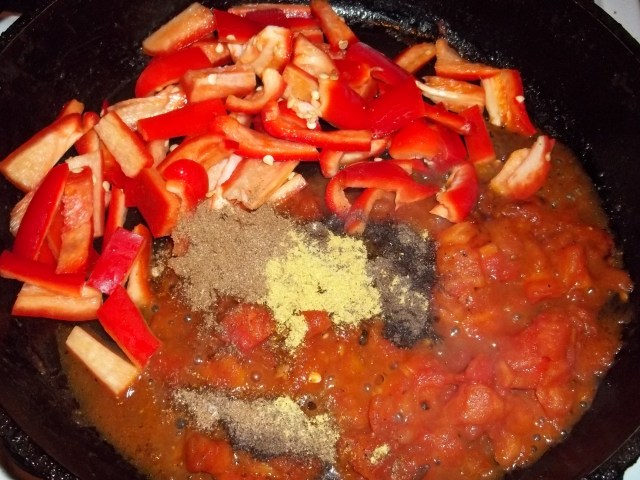 Adding Sweet Peppers and Spices for Khabakhi Recipe