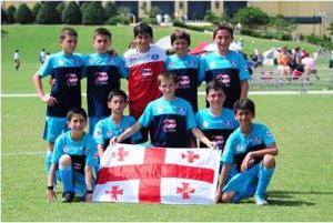 SPORT AND ENTERTAINMENT GAMES ASSOC. GEORGIA BOYS WITH GEORGIAN FLAG