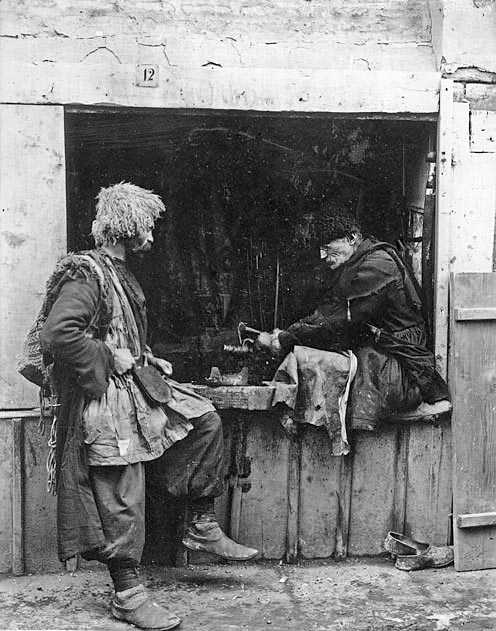 A knife smith and a customer from the mountains