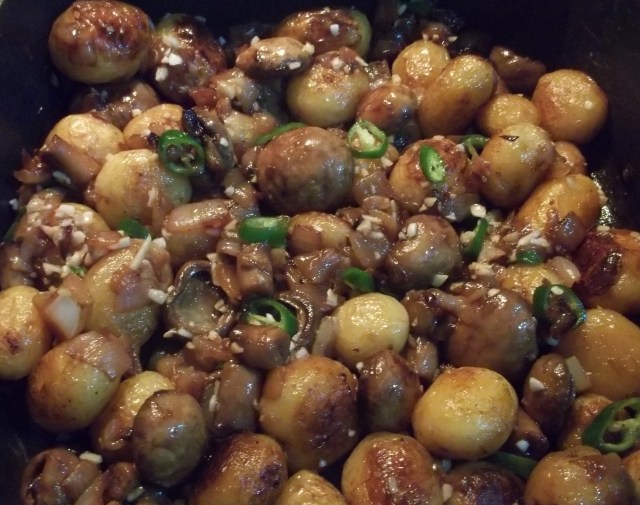 Frying Mushrooms Peppers and Garlic