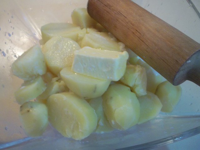 Mashing Potatoes and Butter