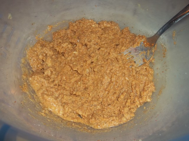 Mixing Spices for Ekala Dish