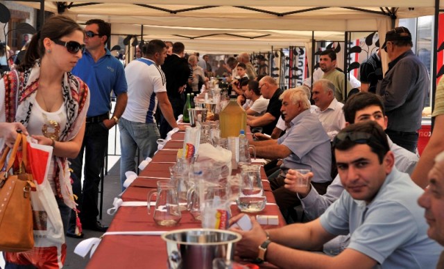 Visitors Sample Wine at the Kartli Wine Festival in Gori