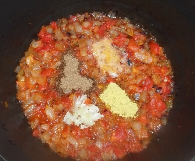 Adding Spices for Lobio with Tomatoes Recipe