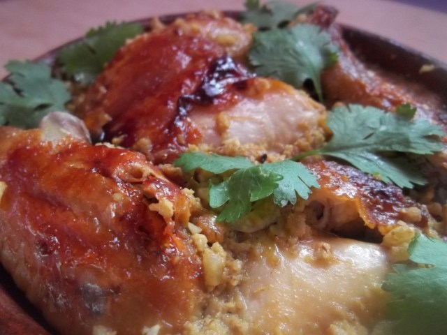 Chicken with Garlic Spices and Nuts Ready for Serving