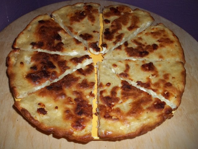 Mokhrakuli Khachapuri Cut for Serving