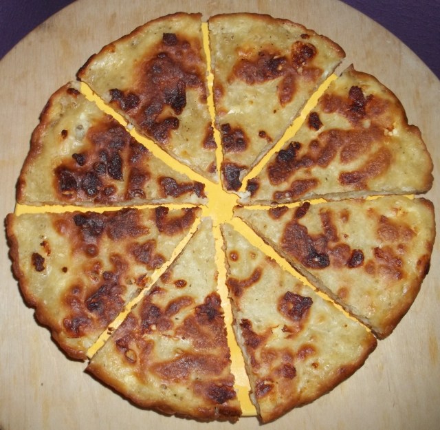 Mokhrakuli Khachapuri Cut into Slices for Serving