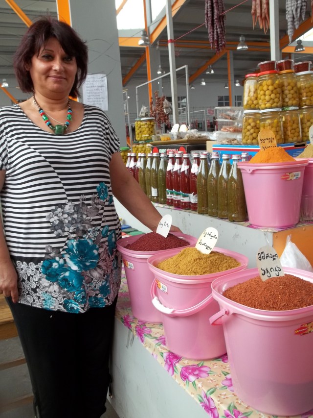 Spice Vendor in a Georgian Market
