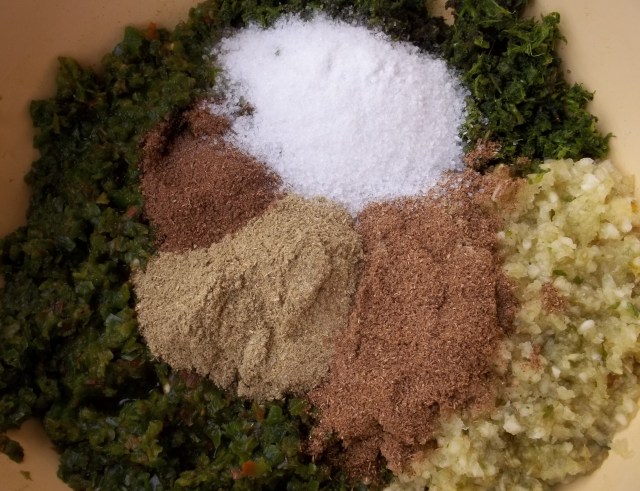 Adding Spices and Salt for Green Ajika Recipe