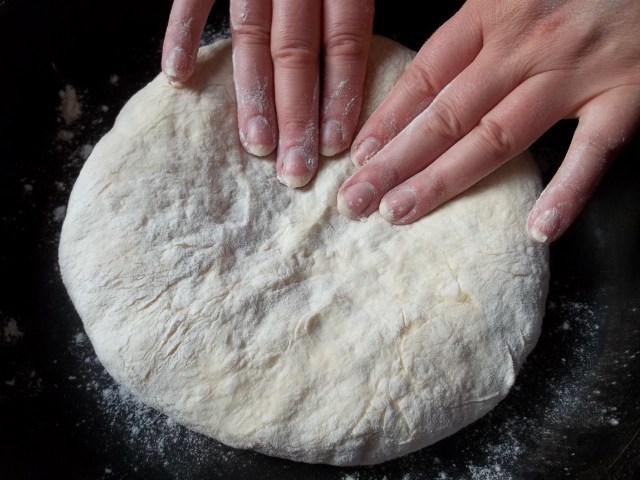 Flattening the Filled Dough for Chakhragina Khachapuri