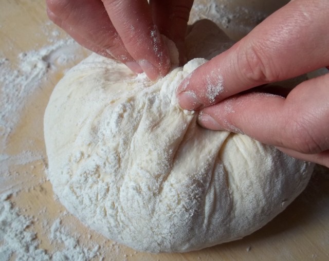 Sealing the Dough for Chakhragina Khachapuri