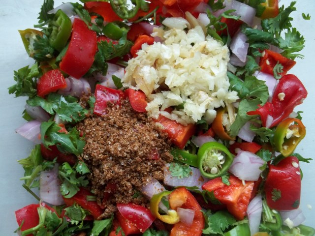 Adding Garlic and Svanetian Salt to Marinated Eggplant with Peppers Recipe
