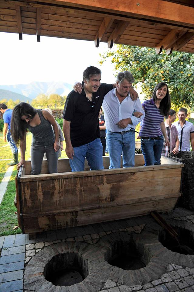 President Saakashvili and Ex-President of Ukraine, Viktor Yushchenko, treading grapes.