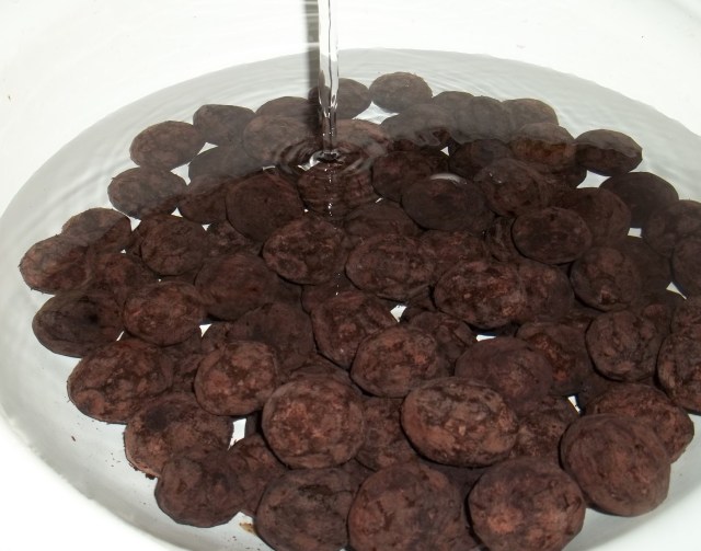 Rinsing the Walnut Fruit for Pickled Walnuts Recipe