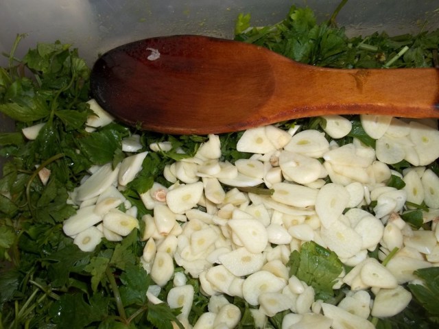 Adding Parsley Green Coriander and Celery Leaves