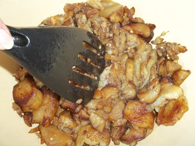 Chopping Fried Eggplant