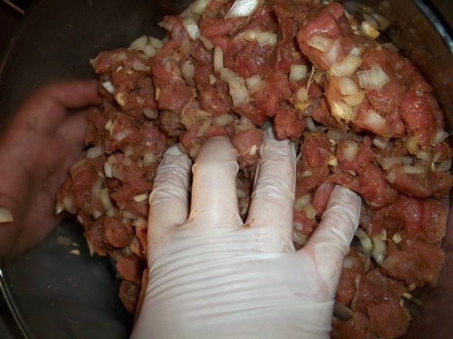 Mixing Meat and Spices for Kubdari Recipe