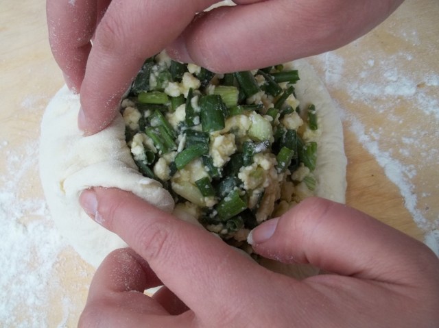 Wrapping the filling for Svanetian Khachapuri