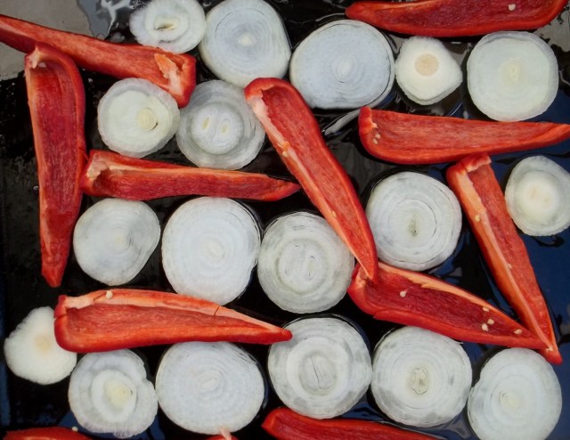 Frying Red Peppers and Onions