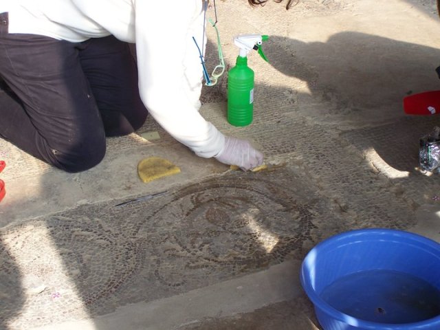 Uncovering a mosaic at Dzalisa Archaeological Site