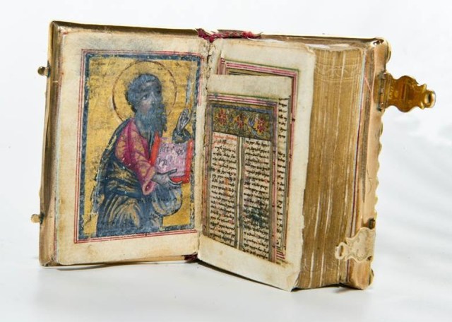 The beautifully illustrated XI century gilded Bible decorated with precious stones