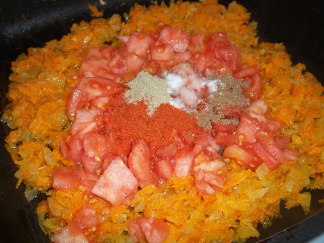 Adding Chopped Tomatoes and Spices