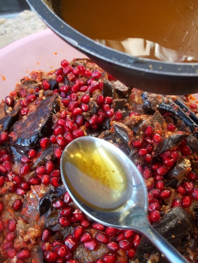 Adding Heated Oil and Marigold