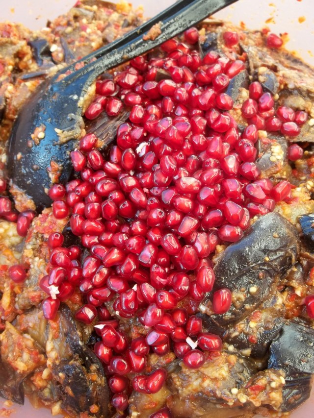 Adding Pomegranate Seeds