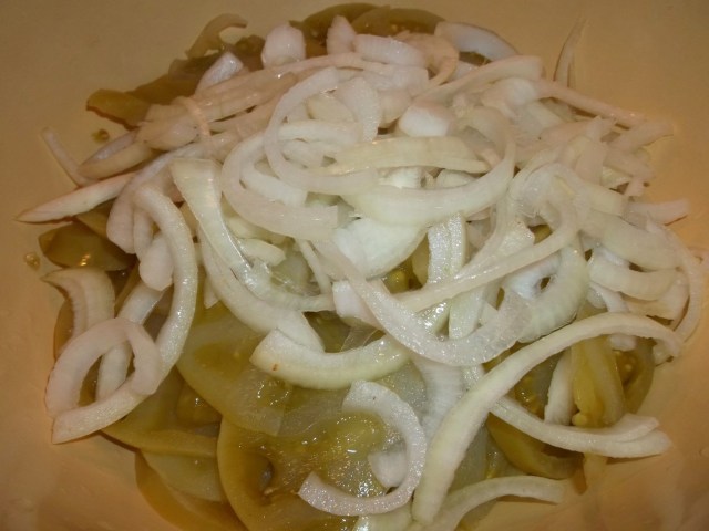 Adding Sliced onions to cooked green tomatoes