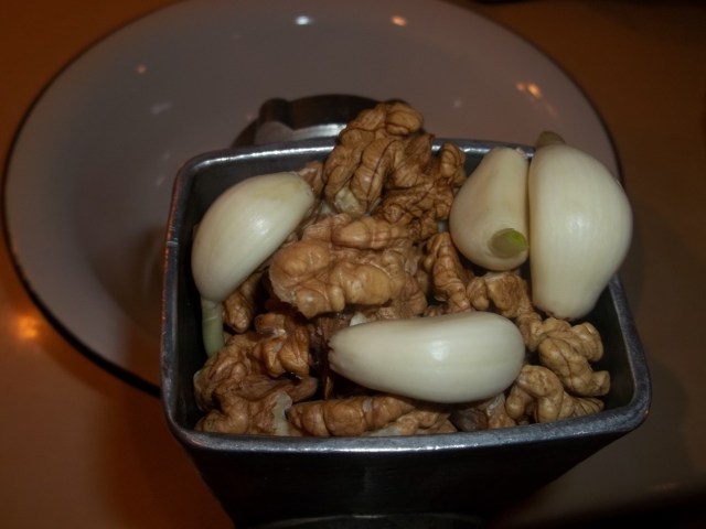 Crushing Walnuts and Garlic