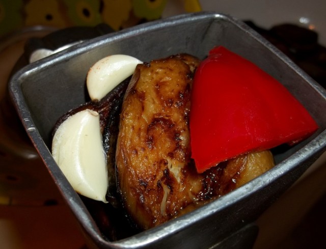 Grinding Eggplant Garlic and Red Pepper