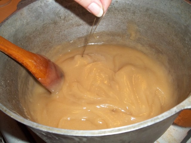 Holding the string of walnuts - Copy