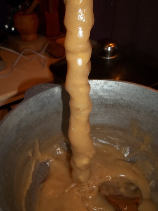 Removing a Churchkhela from the pelamushi - Copy