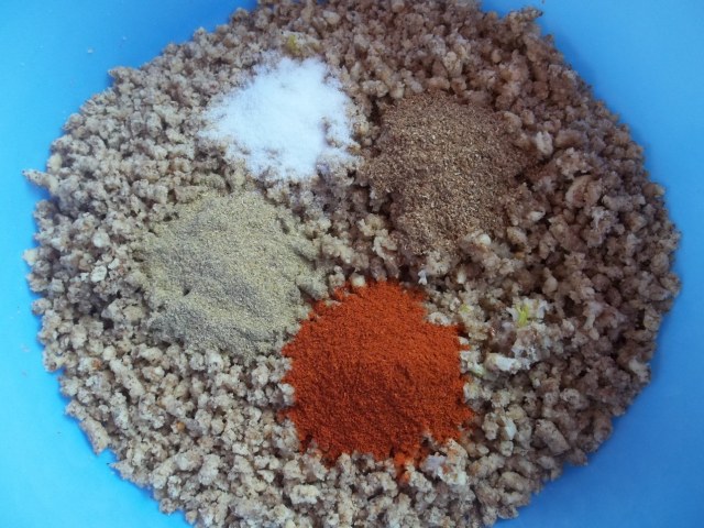 Adding Spices to Walnuts and Garlic - Copy