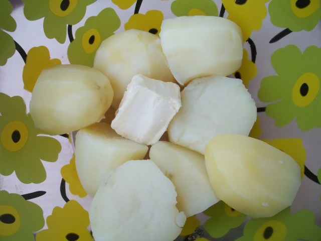 Adding Butter to Boiled Potatoes - Copy