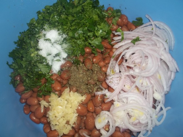 Adding Ingredients to Boiled Lobio Beans - Copy