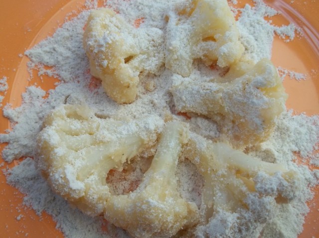 Covering Cauliflower with Mchadi Flour - Copy