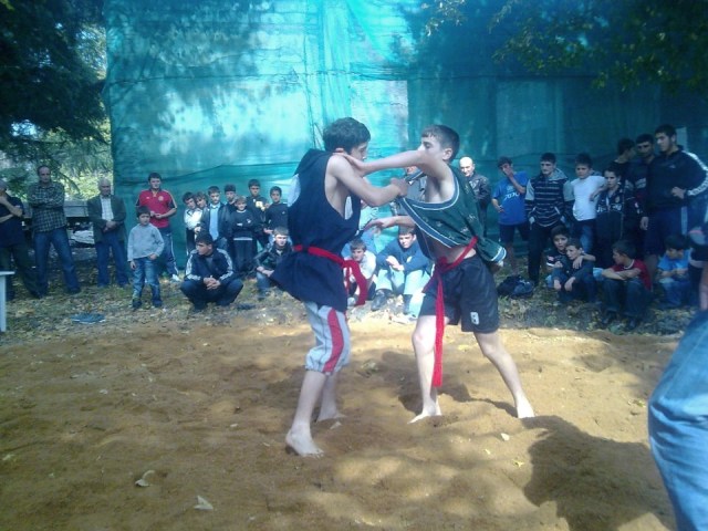 Georgian wrestling competition at the Bidzinaoba Festival