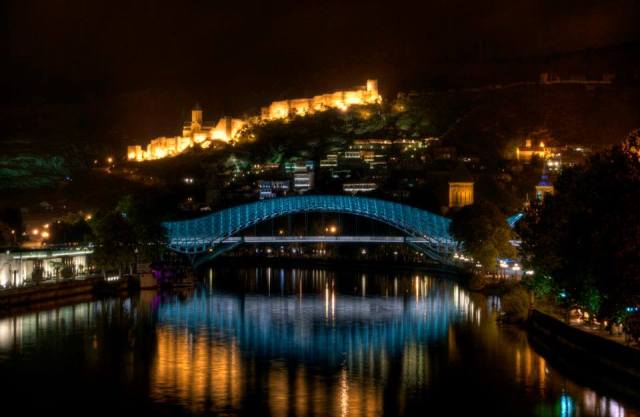Narikala Castle and the Bridge of Peace illuminated at night