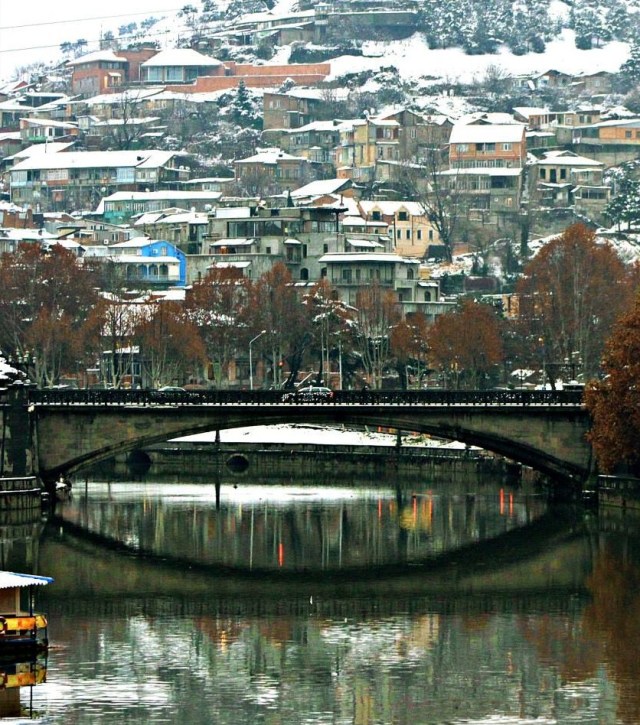 Tbilisi's Old Town and Metekhi Bridge in Winter. 