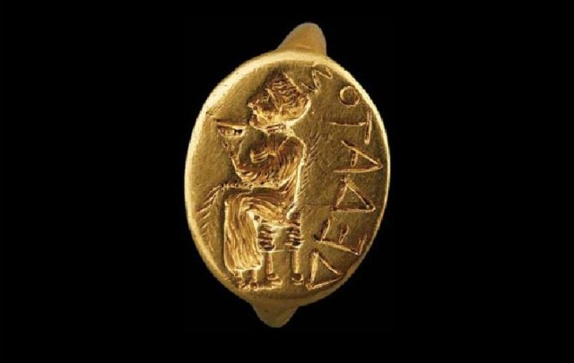 Ring with a seated woman and Greek inscription