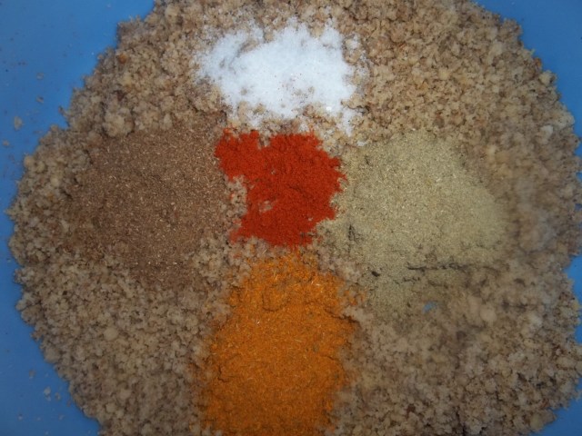 Adding Spices and salt to crushed hazelnuts - Copy