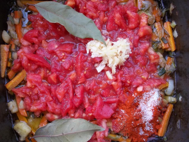 Adding tomatoes and garlic - Copy