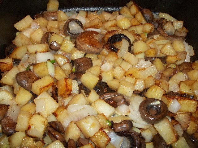 Frying onions potatoes and mushrooms - Copy