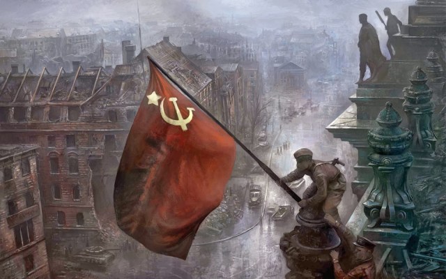 Raising the Soviet flag over the Reichstag in Berlin, 1945 