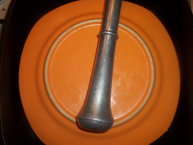 Use a plate and heavy object to keep the chicken flat - Copy