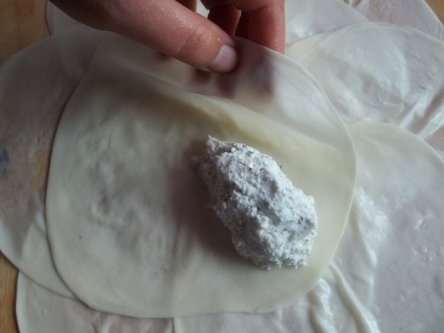 Wrapping the filling with Sulguni Cheese - Copy