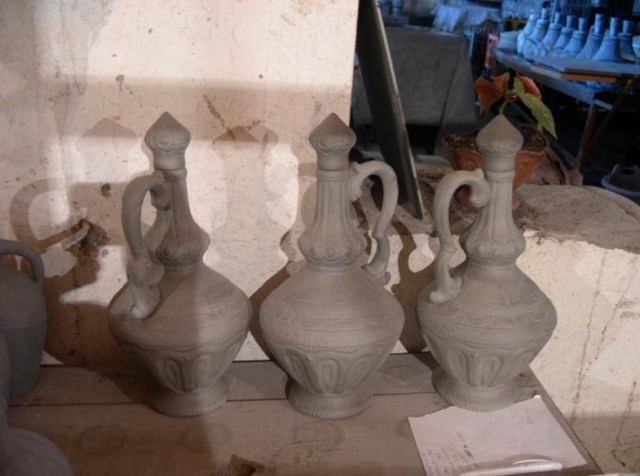 Ceramic wine bottles before glazing and firing.