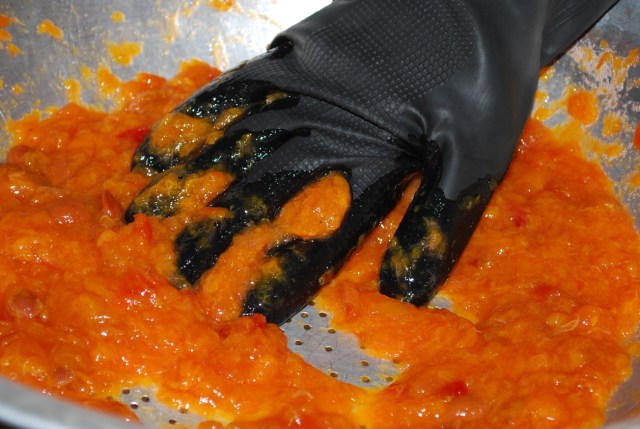 Use a glove to squash the plums - Copy