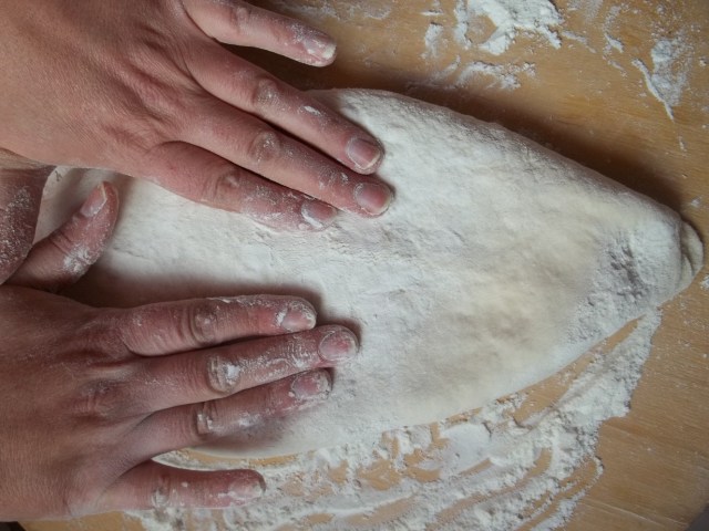 Flattening and shaping the lobiani - Copy